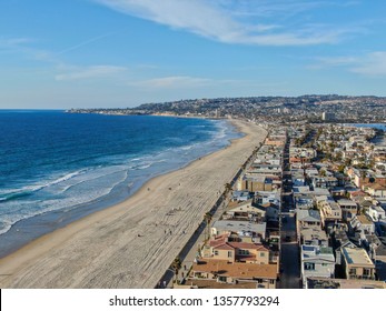 Aerial view of Mission Bay & Beaches in San Diego, California. USA. Community built on a sandbar with villas, sea port.  & recreational Mission Bay Park. Californian beach-lifestyle. 03/18/2019