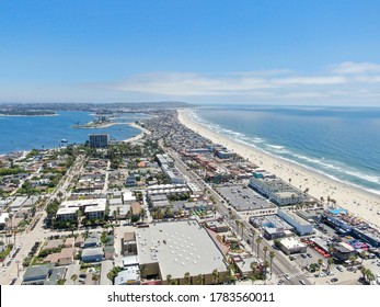 Aerial view of Mission Bay and Pacific Beach in San Diego, California. USA. Community built on a sandbar with villas, sea port and recreational Mission Bay Park. Californian beach-lifestyle.