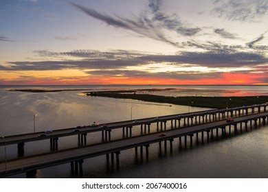 Aerial view of Mobile Bay and interstate 10 bridge at sunset in October of 2021 