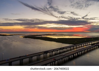 Aerial view of Mobile Bay and interstate 10 bridge at sunset in October of 2021 