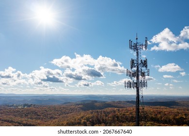 Aerial View Of Mobile Phone Cell Tower Over Forested Rural Area Of West Virginia To Illustrate Lack Of Broadband Internet Service