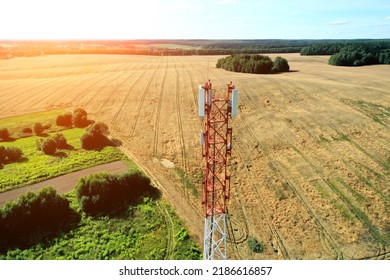 Aerial view of mobile phone cell tower over forested rural area of West Virginia to illustrate lack of broadband internet service.