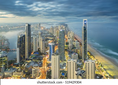 Aerial view of modern buildings with light trail at riverside at Gold Coast, Australia during sunset