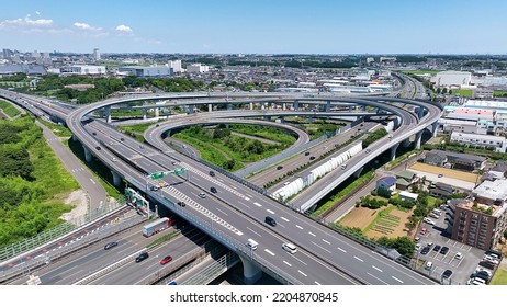 Aerial View Of Modern City And Highway. Drone Point Of View.