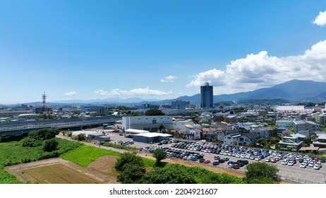 Aerial View Of Modern City And Highway. Drone Point Of View.