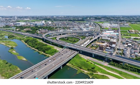 Aerial View Of Modern City And Highway. Drone Point Of View.