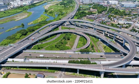 Aerial View Of Modern City And Highway. Drone Point Of View.