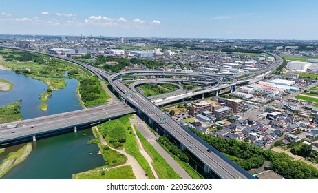 Aerial View Of Modern City And Highway. Drone Point Of View.