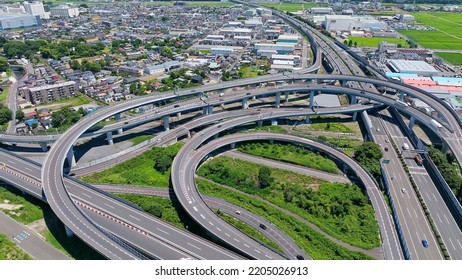 Aerial View Of Modern City And Highway. Drone Point Of View.