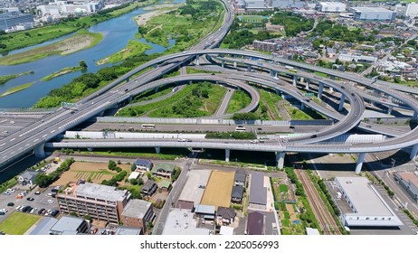 Aerial View Of Modern City And Highway. Drone Point Of View.