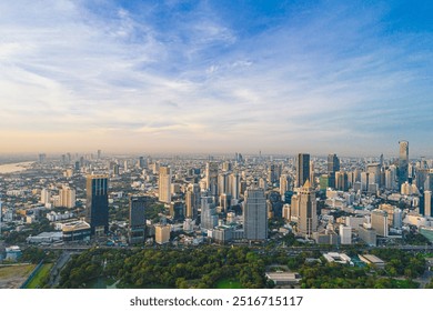 Aerial view modern city office building downtown of Bangkok with green public tropical park, Thailand - Powered by Shutterstock