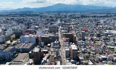 Aerial View Of Modern City And Road. Drone Point Of View.