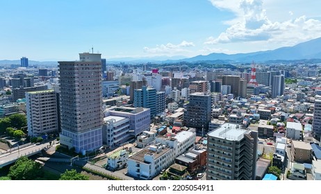 Aerial View Of Modern City And Road. Drone Point Of View.