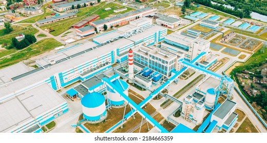 Aerial View Of Modern Paper Mill In Summer Sunny Day. Bird's-eye View Of Paper Factory.