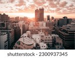 An aerial view of modern skyscrapers in Johannesburg, South Africa at sunset