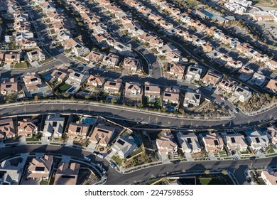 Aerial view of modern suburban homes with rooftop solar in Los Angeles County, California. - Shutterstock ID 2247598553