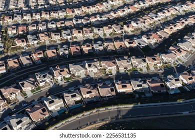 Aerial view of modern suburban homes with solar rooftops in Los Angeles County California. - Shutterstock ID 2256531135