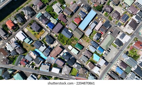 Aerial View Of Modern Town And Road. Drone Point Of View.