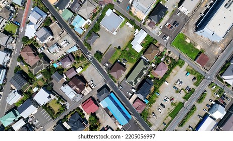 Aerial View Of Modern Town And Road. Drone Point Of View.