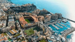 Aerial View Of Monaco City And The Stade Louis II Stadium Venue For Football, Home Of AS Monaco, Located In The Fontvieille District Ft. Famous Monte-Carlo, Cap D’Ail Marina, Monaco Ville 5.5K UHD 