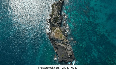 Aerial view of the monastery lighthouse located on a rock in front of Boi beach on the ilha do Principe,Sao Tome,Africa