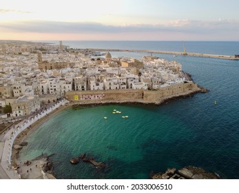 Aerial view of Monopoli Old town in Puglia, (south of Italy) during sunset in 2021