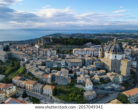 Aerial view of Montefiascone,  Cathedral of Santa Margherita that has one of the largest domes in Italy (27 meters of diameter). Birds eye of Italian city on Bolsena lake, in Viterbo, Lazio, Italy. 