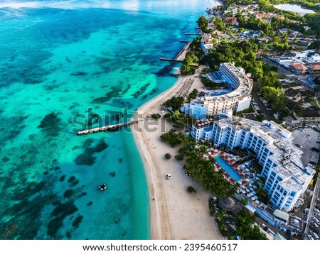 Aerial view of Montego Bay waterfront with hotel and beaches.