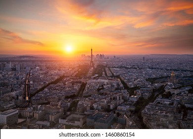 Aerial View, From Montparnasse Tower At Sunset And Night Sky, View Of The Eiffel Tower And La Defense District In Paris, France