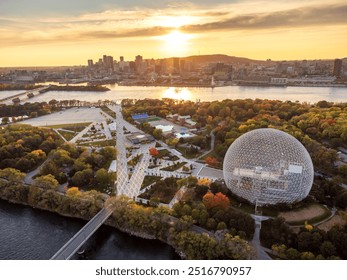 Aerial view of Montreal Biosphere in autumn sunset time, Jean-Drapeau Park, Saint Helen's Island. Montreal City downtown skyline in the background. Quebec, Canada. - Powered by Shutterstock