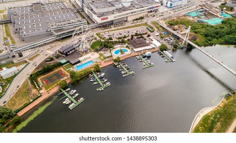 Aerial View. Moscow, Russia 06/2019: Merry Go Round In Vegas Trade Center Outside In Street. Ferris Wheel Myakinino, Krasnogorsk City. Pavshinskaya Poima. Musement Park, Urban Landscape Carousel. Pool