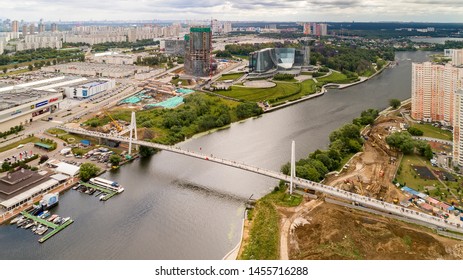 Aerial View. Moscow, Russia 06/2019: Merry Go Round In Vegas Trade Center Outside In Street. Ferris Wheel Myakinino, Krasnogorsk City. Pavshinskaya Poima. Musement Park, Urban Landscape Carousel. Pool