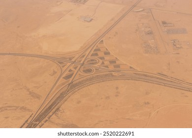 Aerial view of a motorway intersection near King Khalid International Airport in Riyadh, Saudi Arabia - Powered by Shutterstock