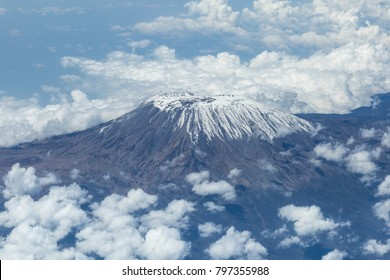 An aerial view of Mount Kilimanjaro, taken from the flight deck of an airplane