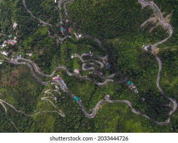 Aerial View Of Mountain Curve Road With Cars, Green Forest. Dehradun Mussoorie Road, Top View Of Beautiful Indian Hilly Road During The Monsoon Season.