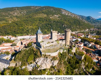 Aerial view of mountainscape in commune of Foix with ancient fortified castle of Chateau de Foix, Ariege, France