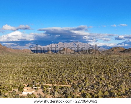 Aerial view of Mt Kimball and Mt Lemmon in Santa Catalina Mountains with Sonoran Desert landscape from Tucson Mountain District in Saguaro National Park in city of Tucson, Arizona AZ, USA. 
