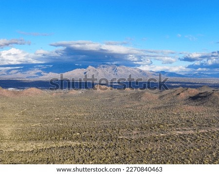 Aerial view of Mt Kimball and Mt Lemmon in Santa Catalina Mountains with Sonoran Desert landscape from Tucson Mountain District in Saguaro National Park in city of Tucson, Arizona AZ, USA. 