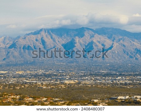 Aerial view of Mt Kimball and Mt Lemmon in Santa Catalina Mountains with Sonoran Desert landscape from Saguaro National Park in city of Tucson, Arizona AZ, USA. 