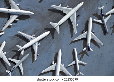 An Aerial View Of Multiple Airplanes On A Runway