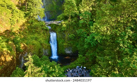 Aerial View of Multnomah Falls with Stone Bridge and Tourists - Powered by Shutterstock