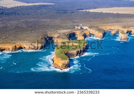 Aerial view of Mutton Bird Island in Loch Ard Gorge on the Great Ocean Road in Victoria, Australia famous attraction of the Port Campbell National Park.
