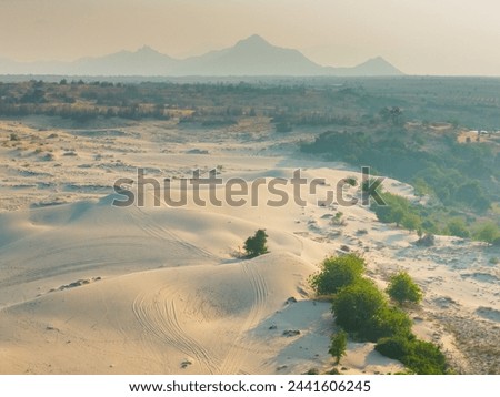 Aerial view of Nam Cuong sand dunes, Ninh Thuan province, Vietnam. It is one of the most beautiful places in Vietnam for travel, adventure and photography concept