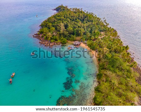 Aerial view of nature tropical paradise island beach enjoin a good summer beautiful time on the beach with clear water and blue sky in Koh kood or Ko Kut, Thailand.
