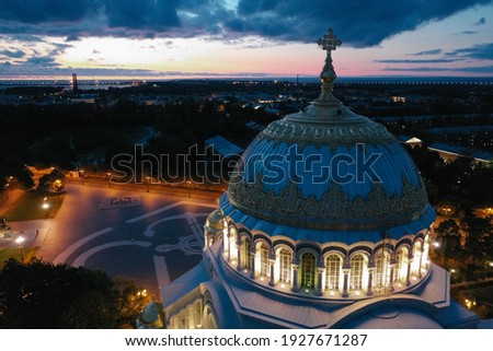 Aerial view of the Naval Cathedral of Nicholas the Wonderworker in Kronstadt at night. Kotlin Island. Detail of the southern facade. Marine anchor. Summer