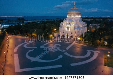 Aerial view of the Naval Cathedral of Nicholas the Wonderworker in Kronstadt at night. Kotlin Island. Detail of the southern facade. Marine anchor. Summer