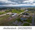 An aerial view of a neighborhood of New Port Richey, Florida surrounded by greenery