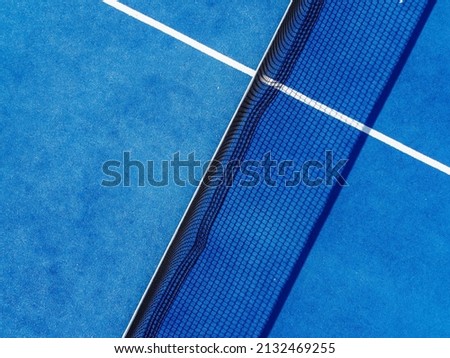 Aerial view of a net and a part of a paddle tennis court
