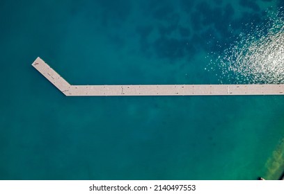 Aerial view of the new breakwater of old town port Cres Croatia.