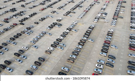 Aerial View Of New Cars Lined Up Parking Outside Factory On Car Factory Background.